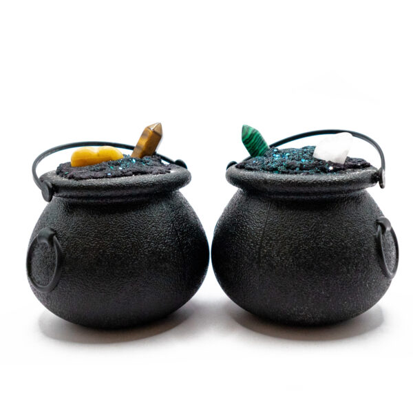 two cauldron-shaped bath bombs