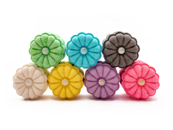 selection of flower-shaped party favor bath bombs