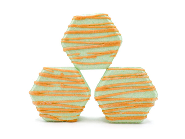 stack of green hexagonal-shaped bath bombs