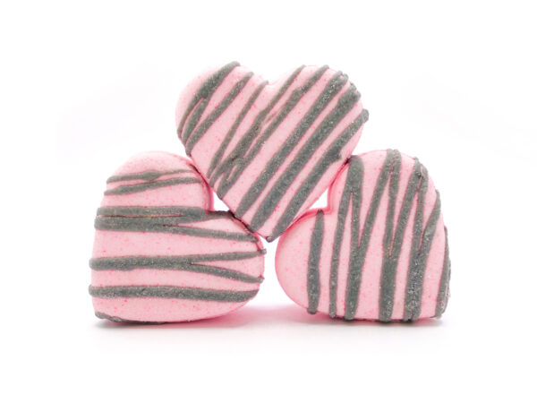 stack of pink heart-shaped bath bombs