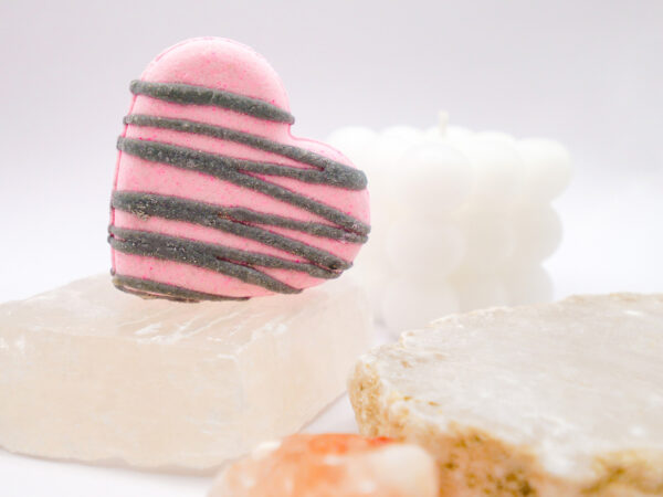 pink heart-shaped prosecco and peony-scented bath bomb